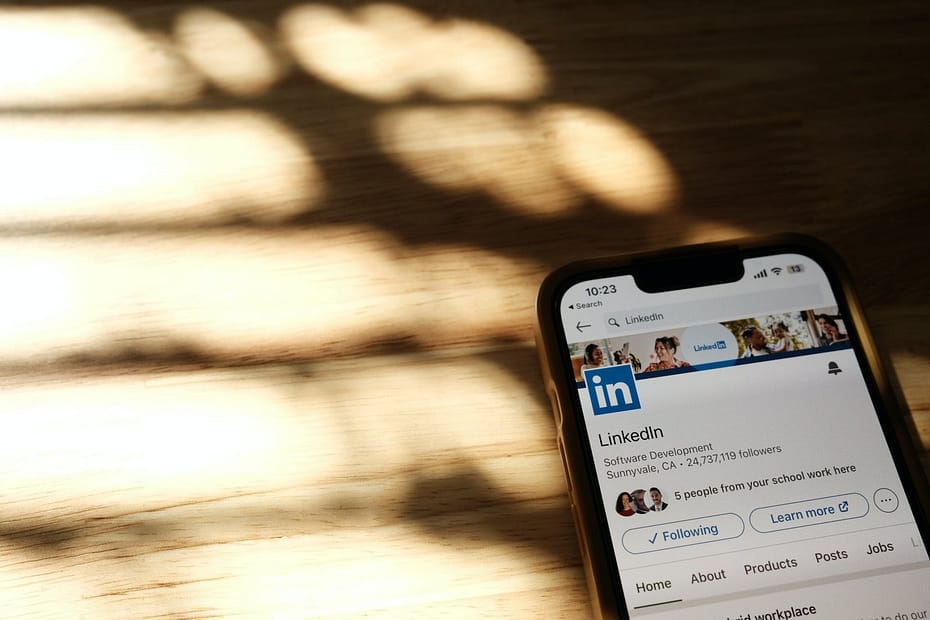 close up of linkedin page on smartphone screen